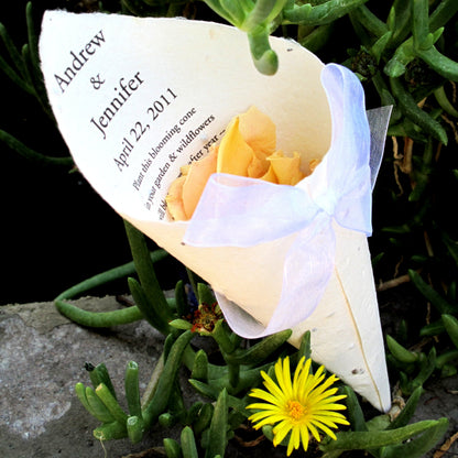 Bulk yellow rose petals for bright wedding aisle and party décor – Prime Petal Company. Personalized wedding cones with yellow rose petals for guest to toss at the bride and groom. flowers on a green plant background